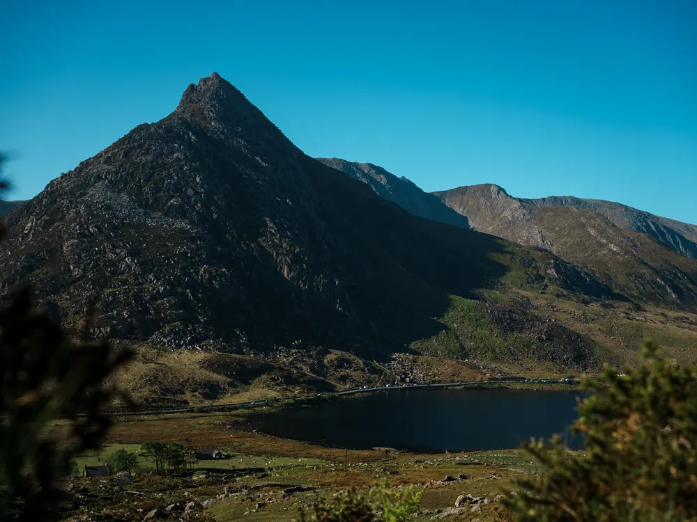 Tryfan's jagged peak above a Snowdonia valley and lake